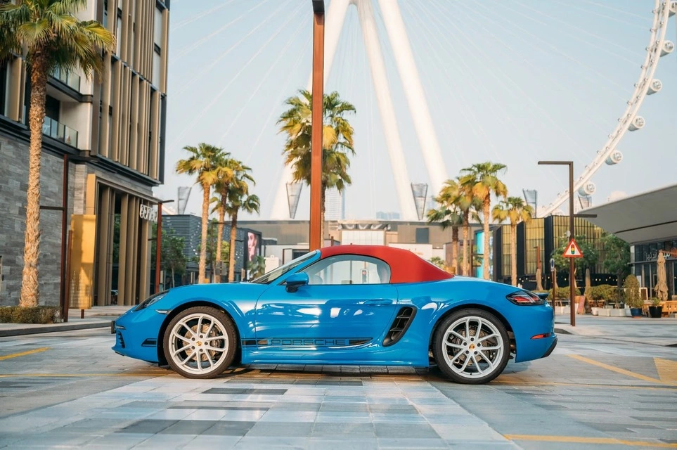 Rent a Porsche Boxster-718 blue, 2023 in Dubai