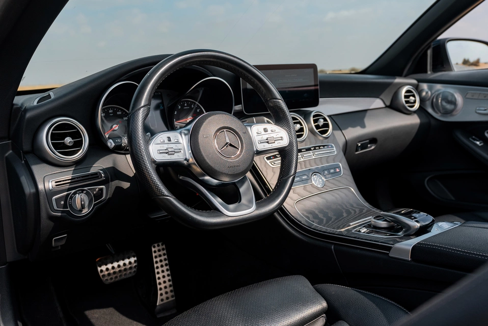 Rent a Mercedes C300-Cabrio black, 2020 in Dubai