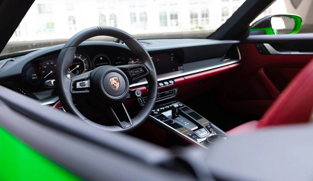 Rent a Porsche 911-Turbo-S green, 2023 in Dubai