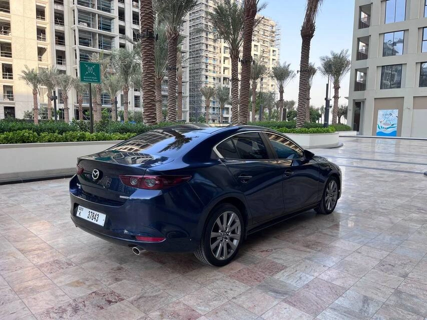 Rent a Mazda 3 dark-blue, 2021 in Dubai