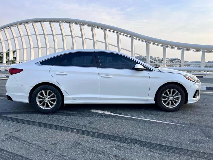 Rent a Hyundai Sonata white, 2019 in Dubai