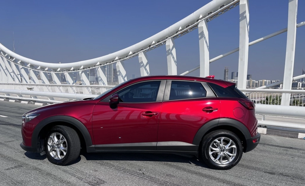 Rent a Mazda CX3 red, 2023 in Dubai