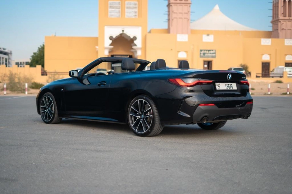 Rent a BMW 430i-Cabrio black, 2023 in Dubai