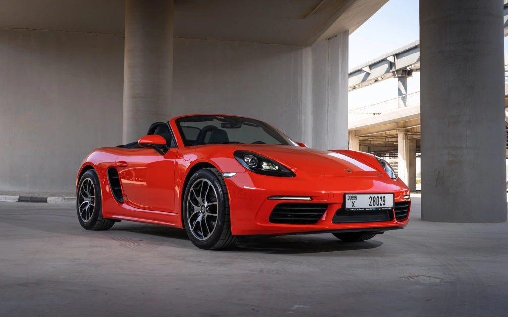 Rent a Porsche Boxster-718 orange, 2020 in Dubai
