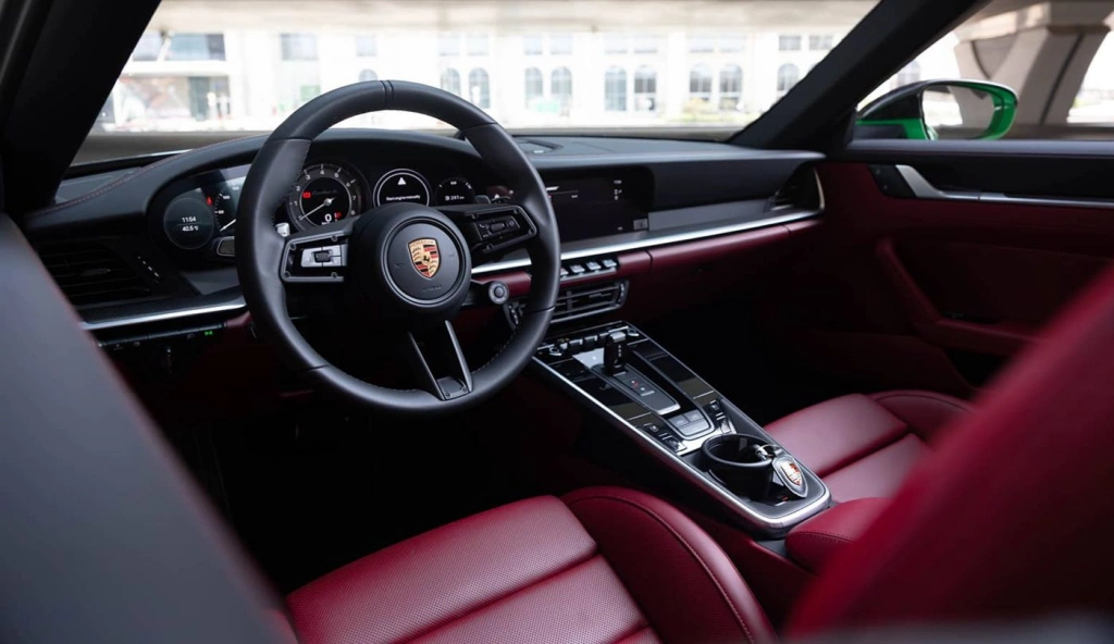 Rent a Porsche 911-Turbo-S green, 2023 in Dubai