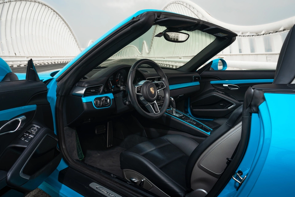 Rent a Porsche 911-Carrera-Cabrio blue, 2018 in Dubai