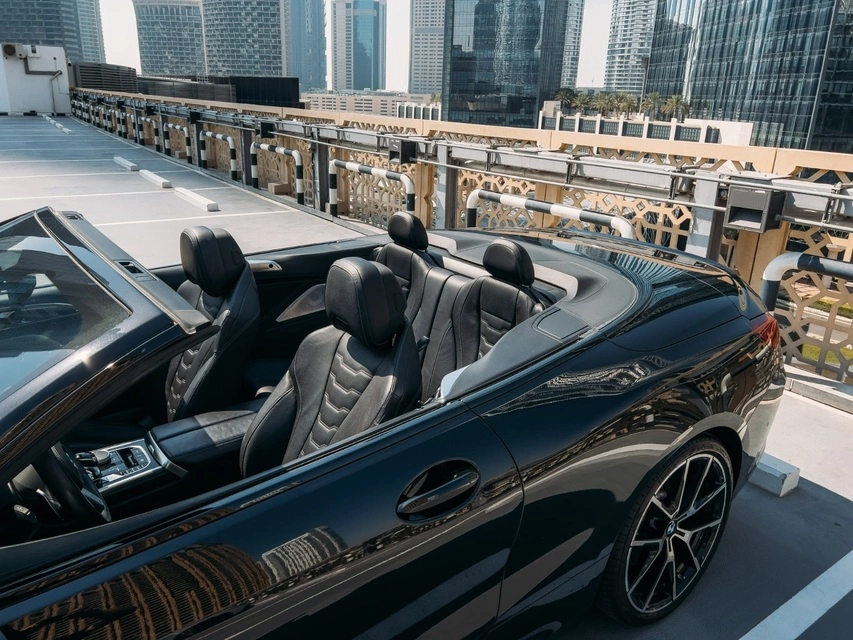 Rent a BMW 840i-Cabrio black, 2022 in Dubai