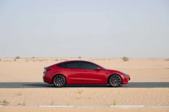 Rent a Tesla Model-3-Perfomance red, 2023 in Dubai