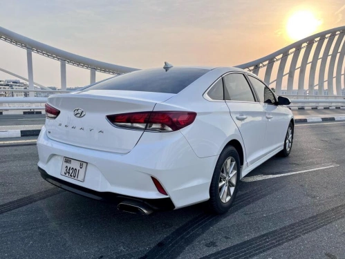 Rent a Hyundai Sonata white, 2019 in Dubai