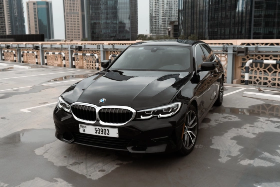 Rent a BMW 330i black, 2021 in Dubai